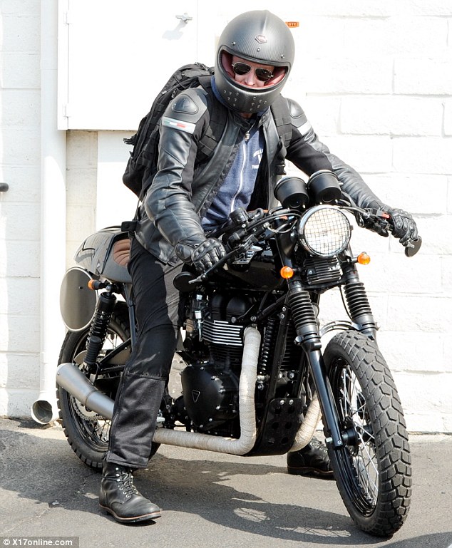 bradley cooper pulls on some leathers and jumps on his motorcycle